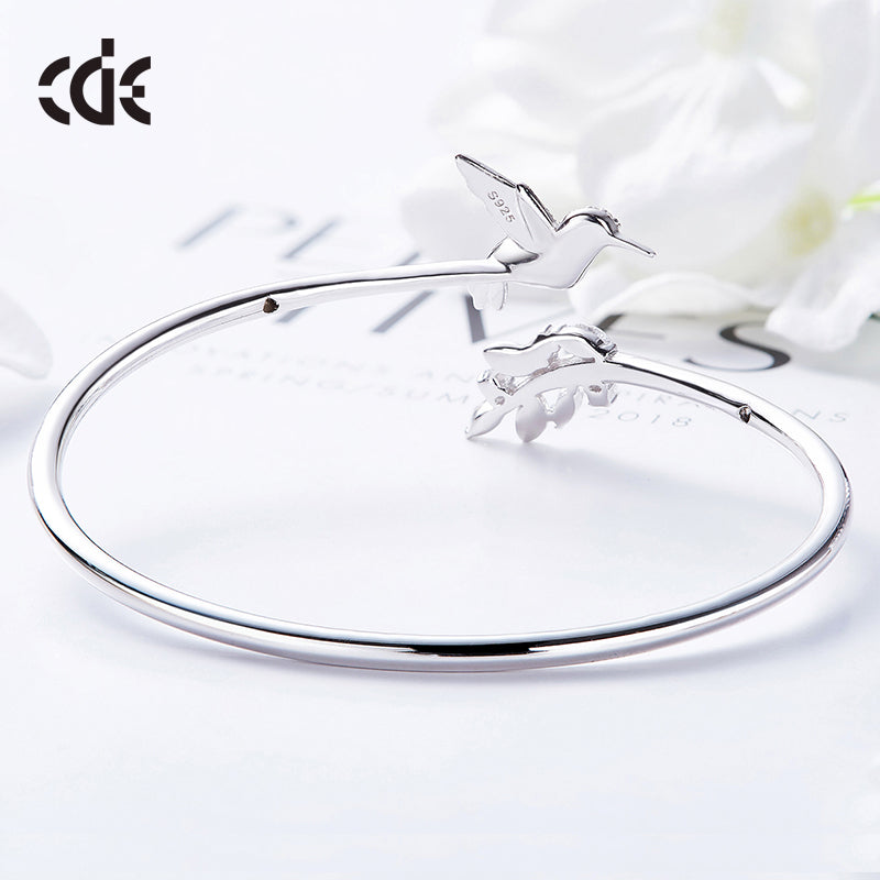 Sterling silver Emerald hummingbird with a shiny leaf bangle - CDE Jewelry Egypt
