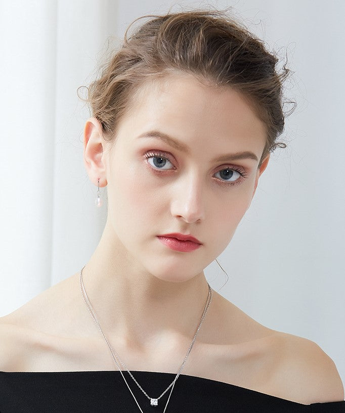 Sterling silver elegant dangling pearl earring - CDE Jewelry Egypt