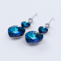 The Dangling sapphire Swarovski crystals hearts earring