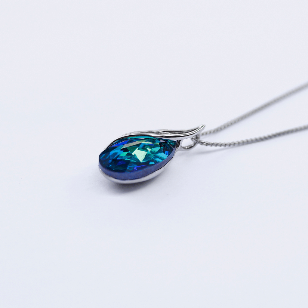 Eyedrop sapphire Swarovski crystal with leaf platinum plated necklace