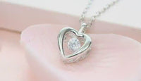 Sterling silver heart shaped dancing crystal necklace