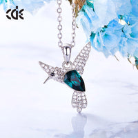 Sterling silver flying Emerald hummingbird necklace - CDE Jewelry Egypt