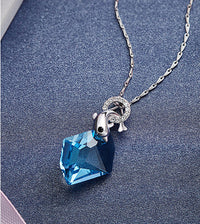 Sterling silver dolphin with blue topaz crystal - CDE Jewelry Egypt