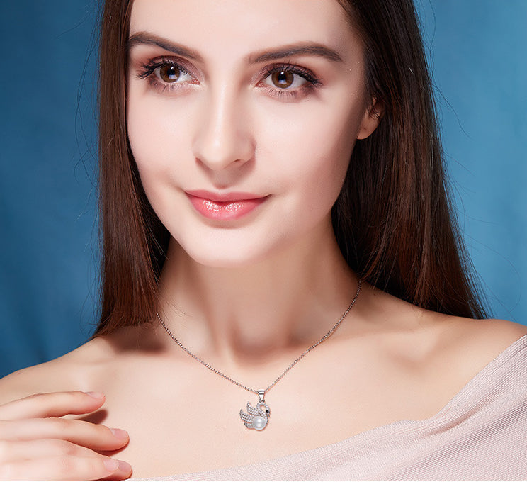 Sterling silver fancy swan with a pearl necklace - CDE Jewelry Egypt