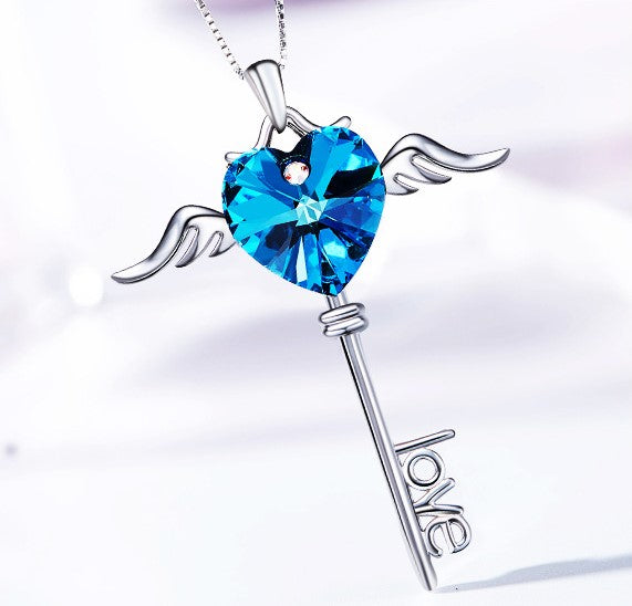 Sterling silver sapphire winged key necklace - CDE Jewelry Egypt