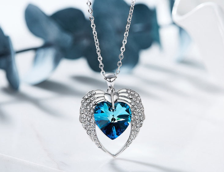 The joined winged hearts sapphire necklace - CDE Jewelry Egypt
